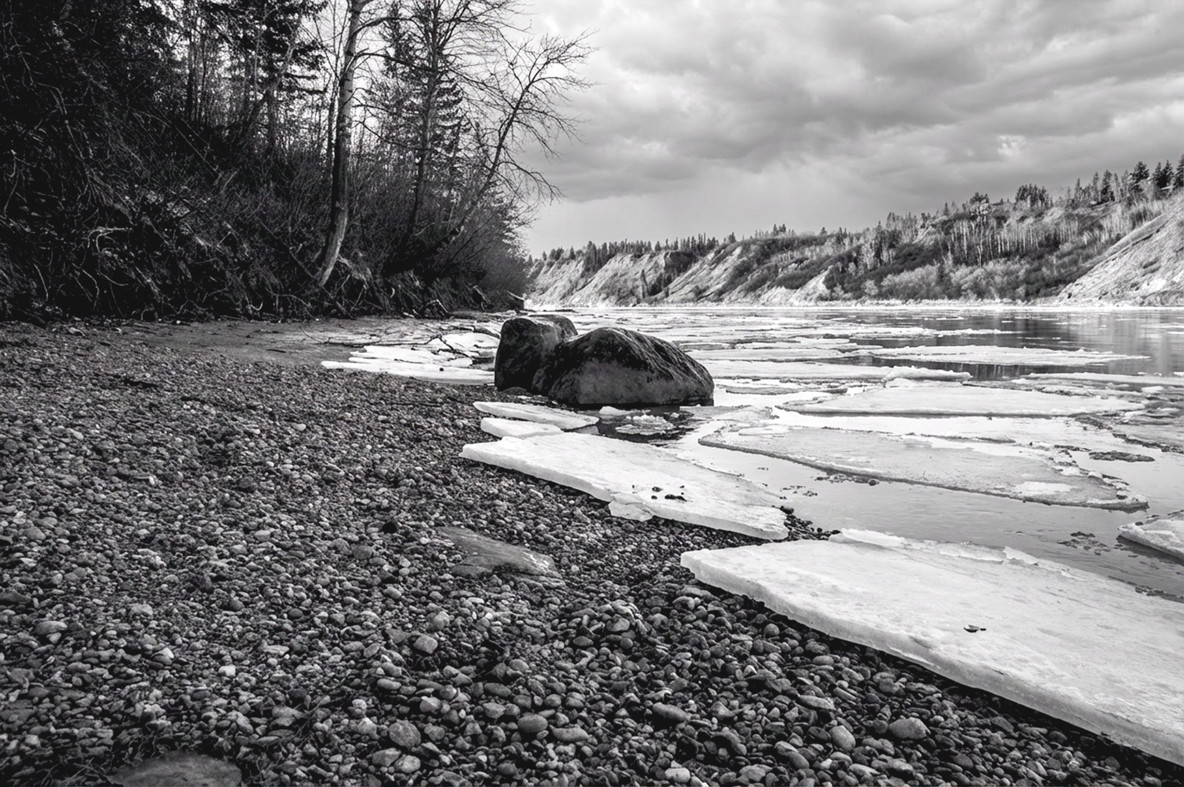 Sheets of winter ice drifting along the North Saskatchewan River