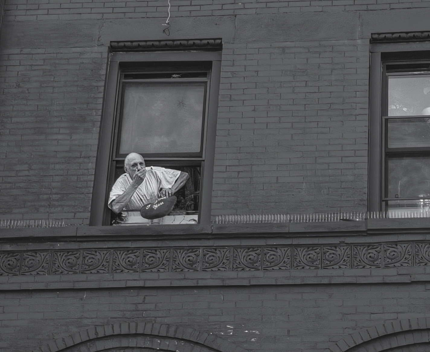 A New Yorker at his window